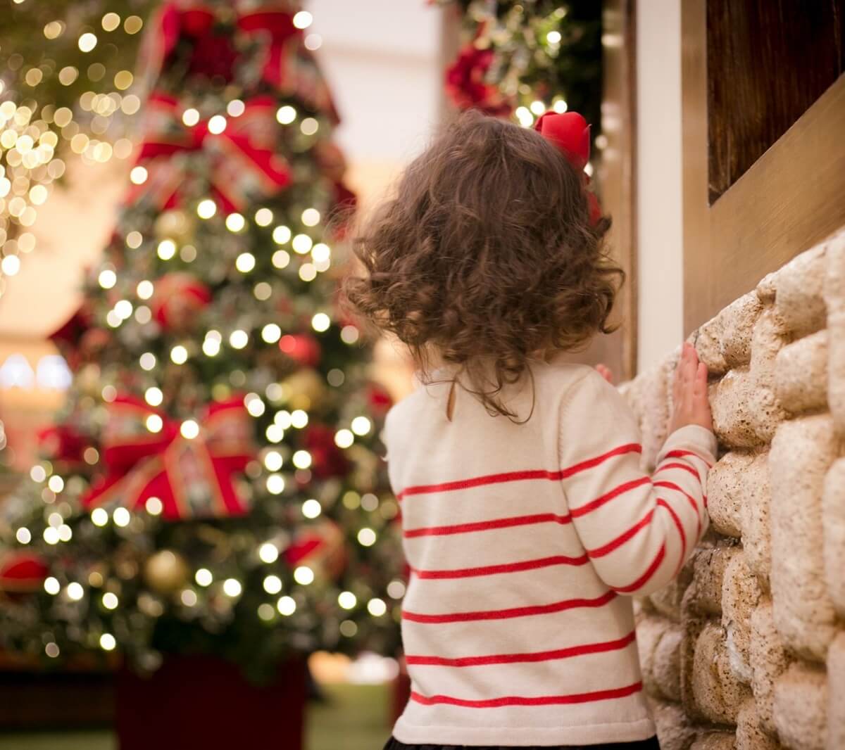 Toddler looking away from camera at Christmas tree thandy-yung-QoCVrrYSKEM-unsplash Toddler looking away from camera at Christmas tree. Photo by <a href="https://unsplash.com/@thandyung?utm_content=creditCopyText&utm_medium=referral&utm_source=unsplash">Thandy Yung</a> on <a href="https://unsplash.com/photos/girl-in-red-and-white-striped-shirt-standing-beside-brown-concrete-wall-QoCVrrYSKEM?utm_content=creditCopyText&utm_medium=referral&utm_source=unsplash">Unsplash</a><br />